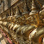 A long line of the golden bird men guarding The Royal Monastery.