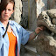 Lynette pondering how to remove the spherical stone from the Lion's mouth and therefore gaining immortality.