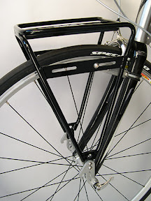 Sherpa Front (Centre) – Load Limit 18kg – $180 The Sherpa Front takes a minimalist approach to carrying your gear. Suspension fork compatible and proven on expeditions far and wide.
