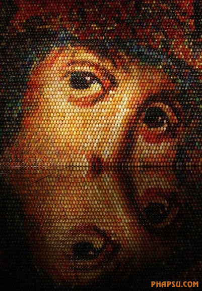 A mosaic of the Virgin Mary is displayed during its unveiling ceremony in Kiev January 13, 2010. The artwork, created by Ukrainian artist Oksana Mas, is made from 15,000 painted Easter eggs. REUTERS/Stringer (UKRAINE - Tags: SOCIETY RELIGION)