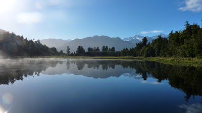 Mist rising over Lake Matheson