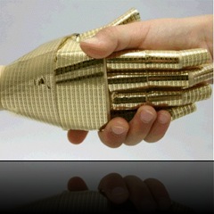 materialism hand shake