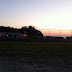 Transporter leaving as the sun sets