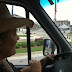 Me driving in the roundabout