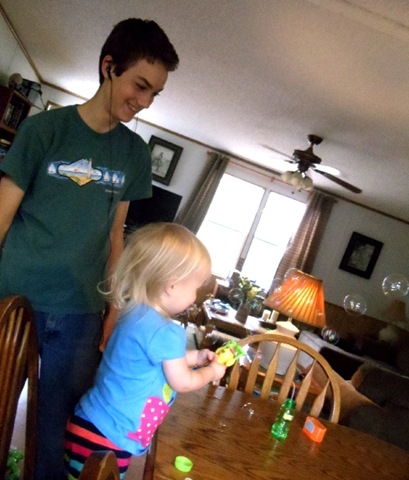 [Uncle Christian helps Lena run bubble machine[6].jpg]