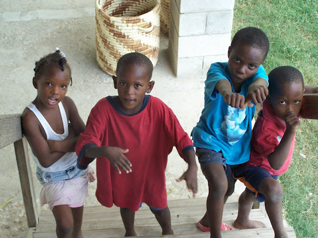 Wanna, Davidson, and Jerry sing, while Little Mackenson accompanies on the thumb.