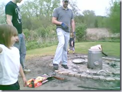 Garbage Can Turkey Cooking