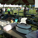 Our selling table (3) - corn on the cob in the cooker, soda to the right
