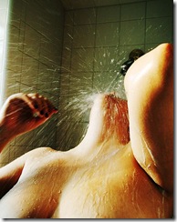 475px-Woman_taking_shower_from_flickr