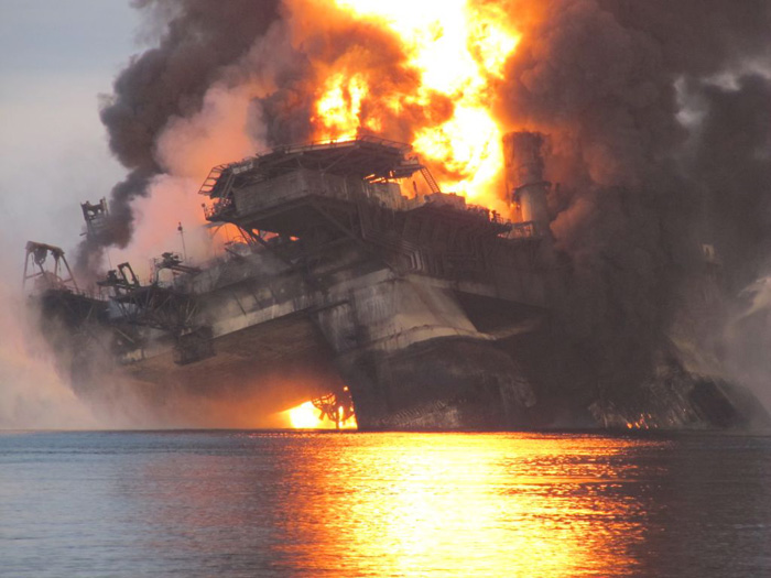 The Deepwater Horizon oil rig burns before sinking into the Gulf of Mexico, sparking a massive cleanup effort. Eleven workers are missing and presumed dead. Department of Energy