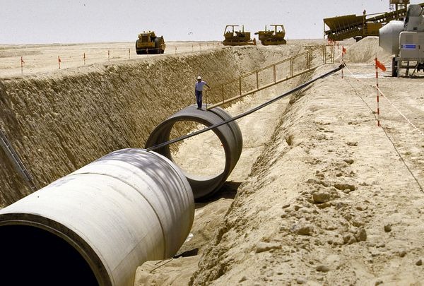 Pipes are put in place for a Libyan water transfer project. Photograph by Thomas Hartwell, Time & Life Pictures / Getty Images