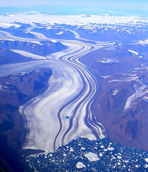 Flying over the melting glaciers of Greenland. Photo: Steve Jurvetson / flickr via commons.wikimedia.org
