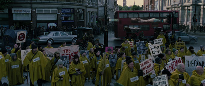 Screenshot from “Children of Men” showing a Doomsday cult. (dir. Alfonso Cuarón, 2006). Graphic: Universal Studios