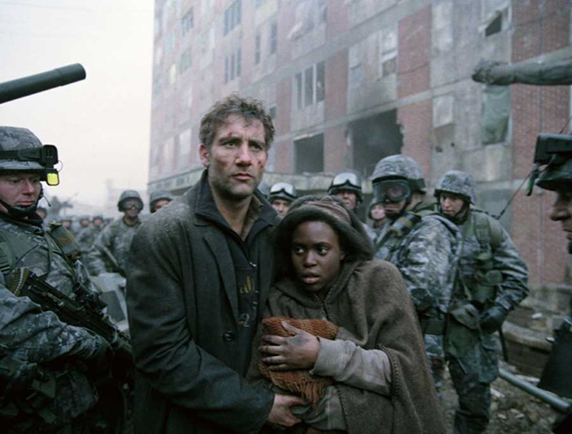 Screenshot from “Children of Men” showing Clive Owen and Clare-Hope Ashitey. (dir. Alfonso Cuarón, 2006). Graphic: Universal Studios