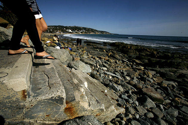 A set of worn concrete steps leads down to the water at Rockpile Beach. (Mark Boster / Los Angeles Times)