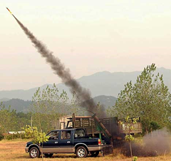 What goes up must come down? A rocket is fired into the sky to seed a rain cloud in rural China. dailymail.co.uk