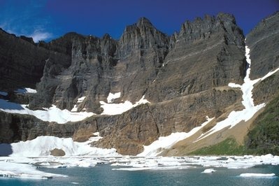 This undated photo provided by the National Park Service shows Iceberg Lake at Glacier National Park, Mt. Scientists on Wednesday, April 7, 2010 said that Glacier National Park has lost two more of its namesake moving icefields to climate change, which is shrinking the rivers of ice until they grind to a halt. (AP Photo / National Park Service)