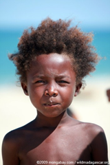 A Vezo boy, a member of a semi-nomadic tribe in southern Madagascar, faces down the camera in Tulear Arovana (Ankorohoke), Madagascar. Photo by: Rhett A. Butler.