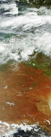 Australia, 5 Feb 2009. Clouds can be seen over the northern part of the country, while the sun-baked southern area is cloud-free. via eosnap.com