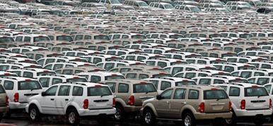 Dodge SUVs sit parked in the Atlantic Marine Terminal at the port of Baltimore February 18, 2009 in Baltimore, Maryland. As the worldwide economic downturn persists and automobile sales continue to slow, more than 57,000 new automobiles sit idle in the port of Maryland. The state of Maryland recently paid $5.26 million for almost 15 acres of additional car storage space near the port, freeing space for more cargo. (Chip Somodevilla/Getty Images)