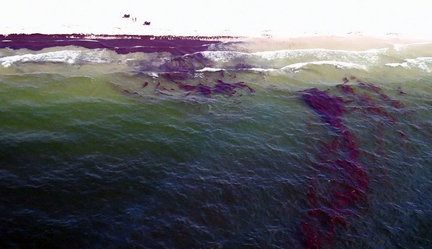 Oil is seen washing onto the white sands of a Gulf Shores, Ala., beach on Friday, June 11, 2010, in this still image from a Press-Register video. The image was captured from aboard an Alabama National Guard helicopter. Press-Register / Robert McClendon