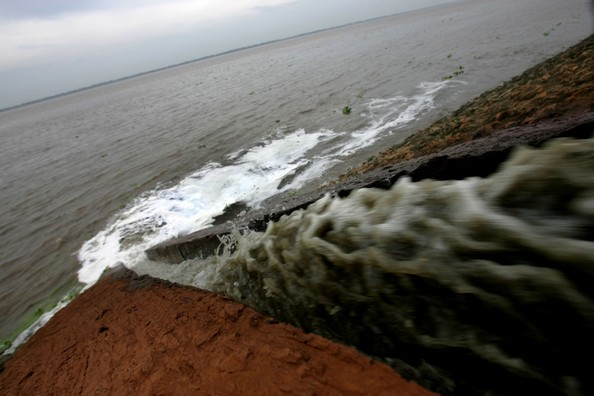 Polluted water runs into the Qiantang River at the Xiaoshan Section on July 10, 2007 in Hangzhou of Zhejiang Province, east China. Mass water pollution incidents are on the rise as China's environment deteriorates. A State Council executive meeting presided over by Premier Wen Jiabao stressed the need to amend the existing law on handling of water pollution, allowing for harsher punishment for illegal practices. July 10, 2007 - Photo by China Photos / Getty Images News