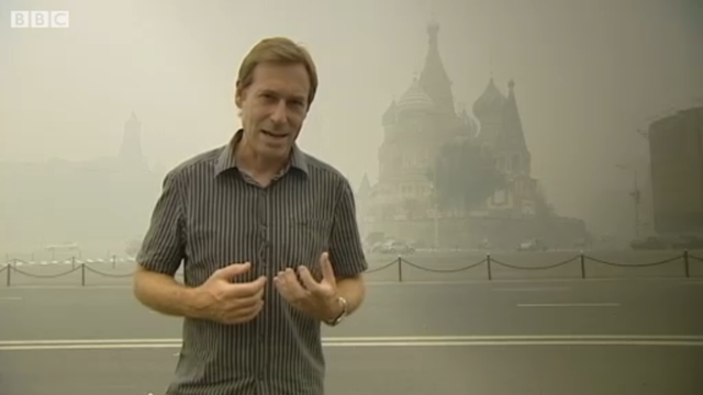 The BBC's Richard Galpin stands in front of St. Basil's Cathedral as smoke from wildfires cloaks the city of Moscow, 6 August 2010. 'The smoke is absolutely choking.' BBC