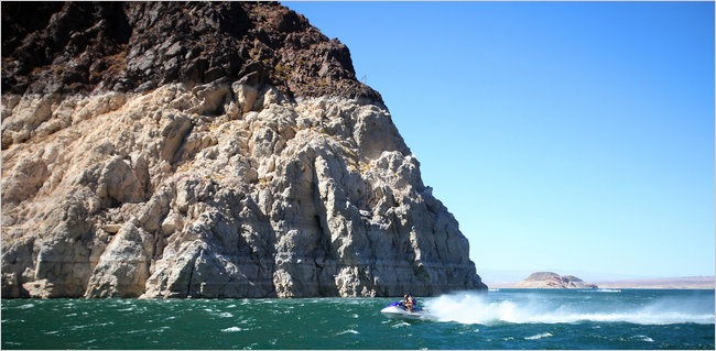 Alkaline bathtub rings reflect the falling water level on Lake Mead's walls, September 2010. Jim Wilson / The New York Times