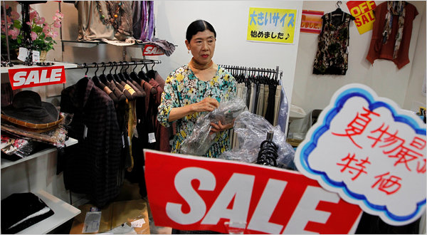 DISPIRITED: Akiko Oka has worked part time in an Osaka clothing shop since her store closed in 2002. She said she lamented Japan’s loss of vigor. Hiro Komae for The New York Times