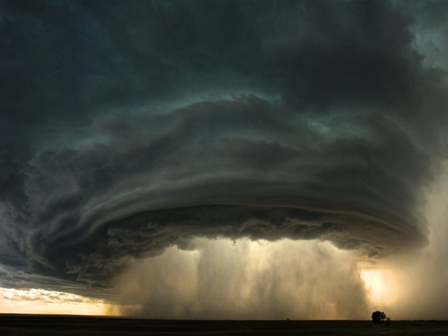 Montana Thunderstorm. A supercell thunderstorm rolls across the Montana prairie at sunset. Photo and caption by Sean Heavey / nationalgeographic.com