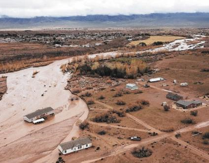 Floodwaters flow down the Beaver Dam Wash toward the Virgin River northeast of Mesquite in this aerial photograph taken Dec. 23, 2010. The torrent made its way downstream to Lake Mead, raising the reservoir's surface by about a foot and a half. JASON BEAN / LAS VEGAS REVIEW-JOURNAL