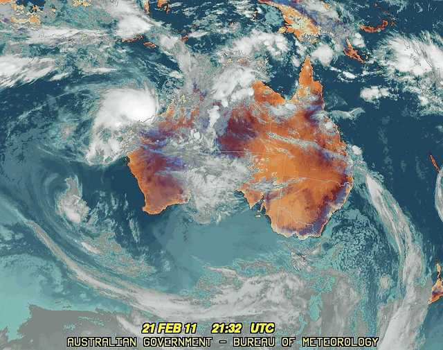 Satellite image of Cyclone Carlos hovering over Darwin, Australia, 21 February 2011. Source: Image from Japan Meteorological Agency satellite MTSAT-1R. Captured: Monday 21 February 2011 21:30 UTC. UTC is equivalent to 22 February 08:30 AEDT. bom.gov.au