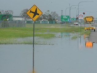 BIG WET: Extensive flooding on Ingham Road, Garbutt, in Townsville, 11 March 2011. Suzanne Lowe / Townsville Bulletin / couriermail.com.au