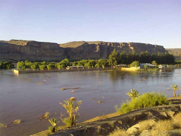 Amanzi Trails structures submerged beneath the flooded Orange River, Namibia, 18 January 2011. The Orange River reached almost 9 metres over the weekend. The water level started rising after the sluices of the Vaal and Bloemhof dams were opened in South Africa. Amanzi Trails / travelnews.com.na