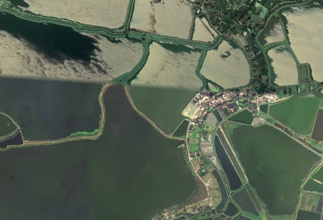 Satellite view of the Kolkata Wetland System and sewage-fed fish farms. Google Earth / johnedwardcochran.wordpress.com