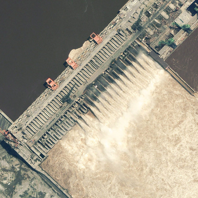 Satellite image of Three Gorges Dam, China, 13 July 2003. This is is a true color satellite image of the Three Gorges Dam on the Yangzi river, Hubei province, China. Photo DigitalGlobe