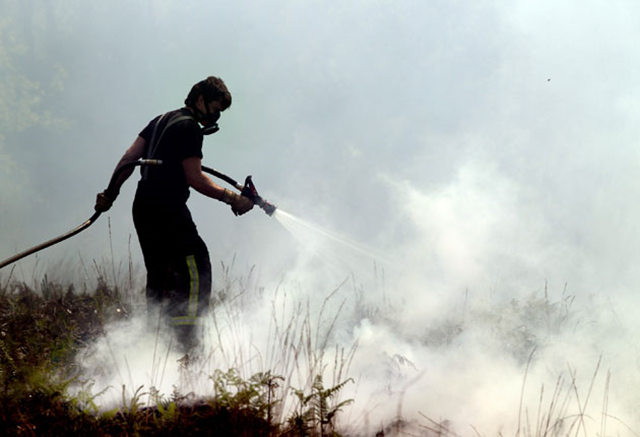 Firefighters have already been working 'to the point of exhaustion' to tackle forest fires during one of Britain's driest springs on record. Getty Images