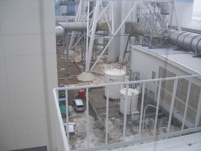 Tsunami wave inundates the Fukushima Daiichi Nuclear Power Station, 11 March 2011. The location is the north side of the Radiation Waste Treatment Facility, taken from 4th floor at approximately 3:42 PM. TEPCO