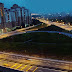 Highway at night. not that bad. not much traffic but still loud like motor is passing next to you.