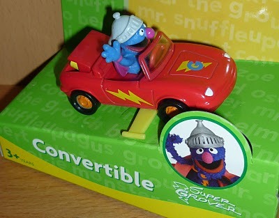 Super Grover in his convertible car Super Grover in his convertible car