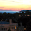 A view of Lake Erie and some Buffalo apartment buildings at sunset.
