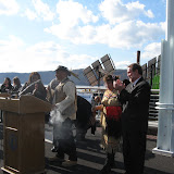 Two representatives of local Native American tribes, Tony Moon Hawk and Marcey Wind In The Trees attended the arrival of the Barge.
