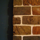 A close up of the backsplash next to the new wall color.