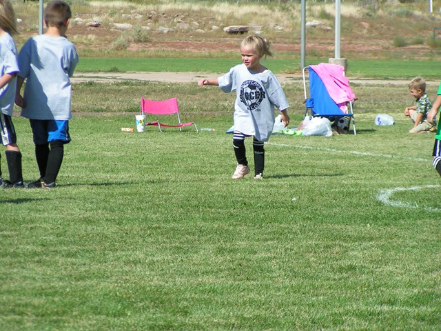 [Brynn, age 5 playing in her first soccer game[2].jpg]
