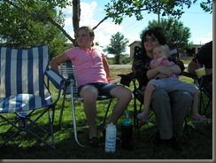 Torri, Grandma Rhonda and Alise watching Brynns soccer game