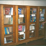 Claudio Davila, headteacher of the Rosario Mayorga Primary School in Villa España, shows the sum total of the resources available to the new library (as at April 2005)