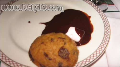 Cookie Dipped in Dark Chocolate Fondue