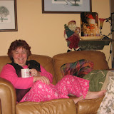 Katie's mom relaxing Christmas morning with her grandma mug and scarf from Malaysia