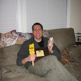 Dan showing off his Christmas gifts (2009)