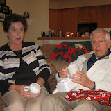 Dan's parents open up their customized grandparent mugs, Christmas 2009